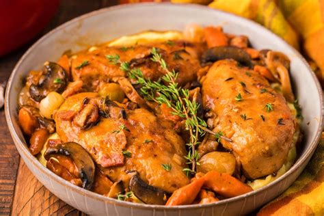  Coq au Vin: The Richness of Red Wine Embraces the Tenderness of Slow-Cooked Chicken!